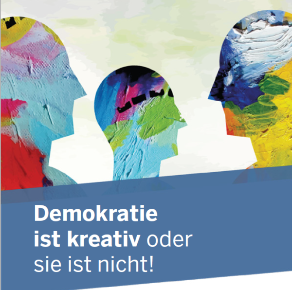 Grafik bunter Köpfe mit Unterschrift "Demokratie ist krativ oder sie ist nicht!"